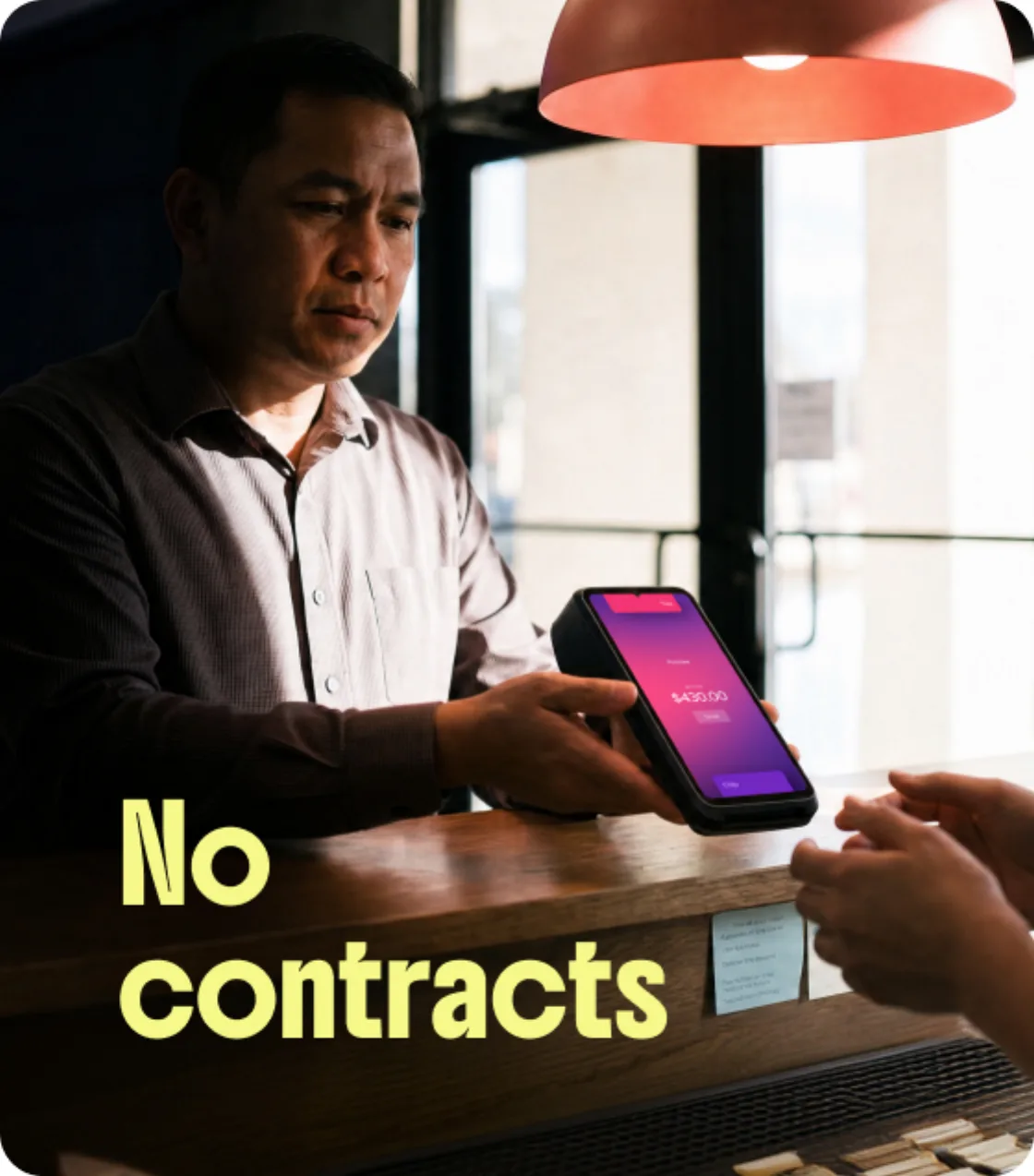 No contracts — a merchant taking a $420.00 payment on a Helcim card reader