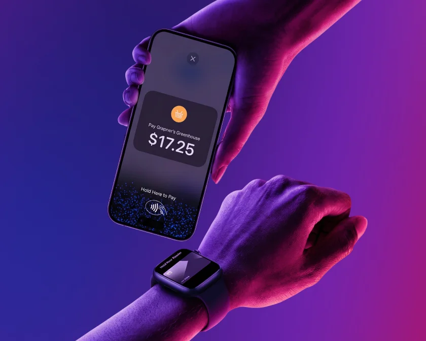 An iPhone accepting a contactless payment from an Apple Watch with Tap to Pay