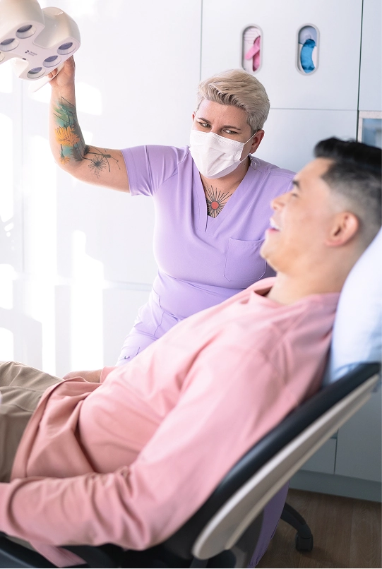 Dentist treating a patient in a modern dental office