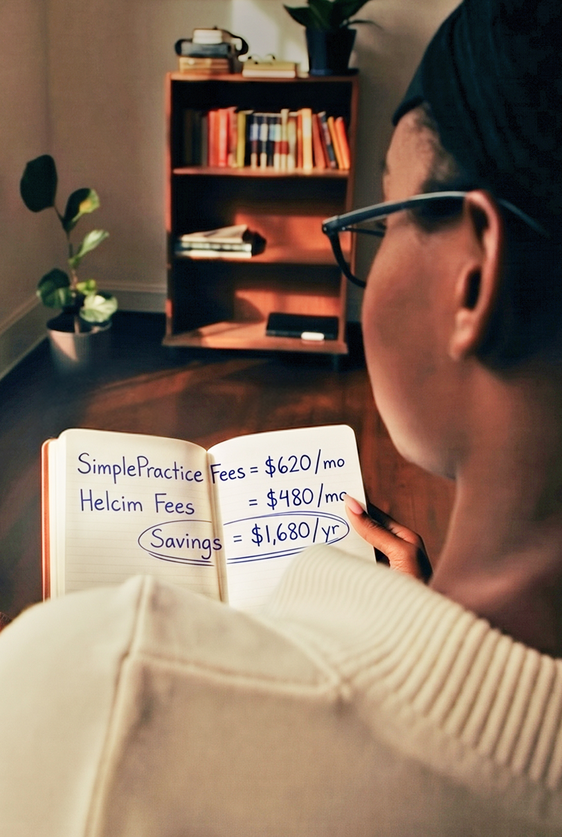 Mental health practitioner reviewing fee comparison between SimplePractice and Helcim