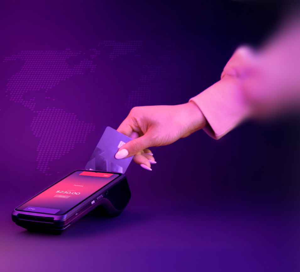 A customer tapping a credit card on a Helcim Smart Terminal