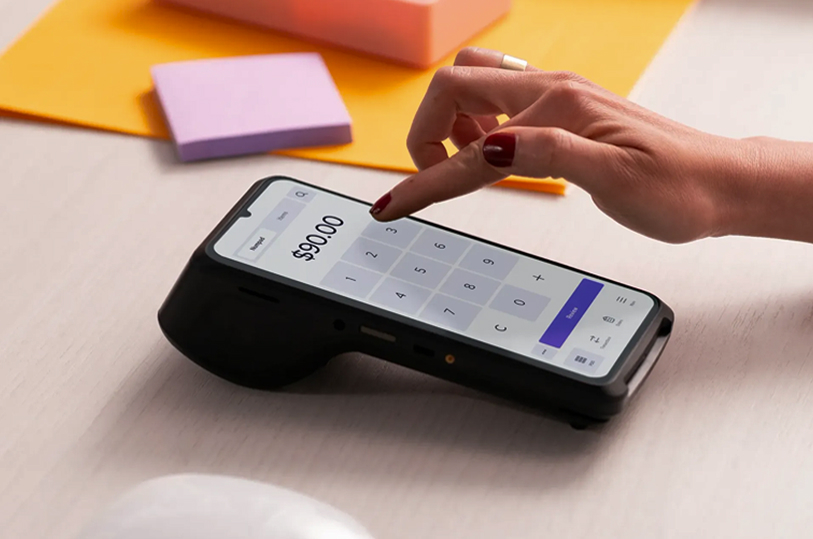 Hand entering amount on Helcim payment terminal
