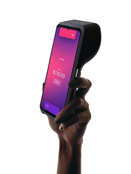 Helcim Smart Terminal held in a hand