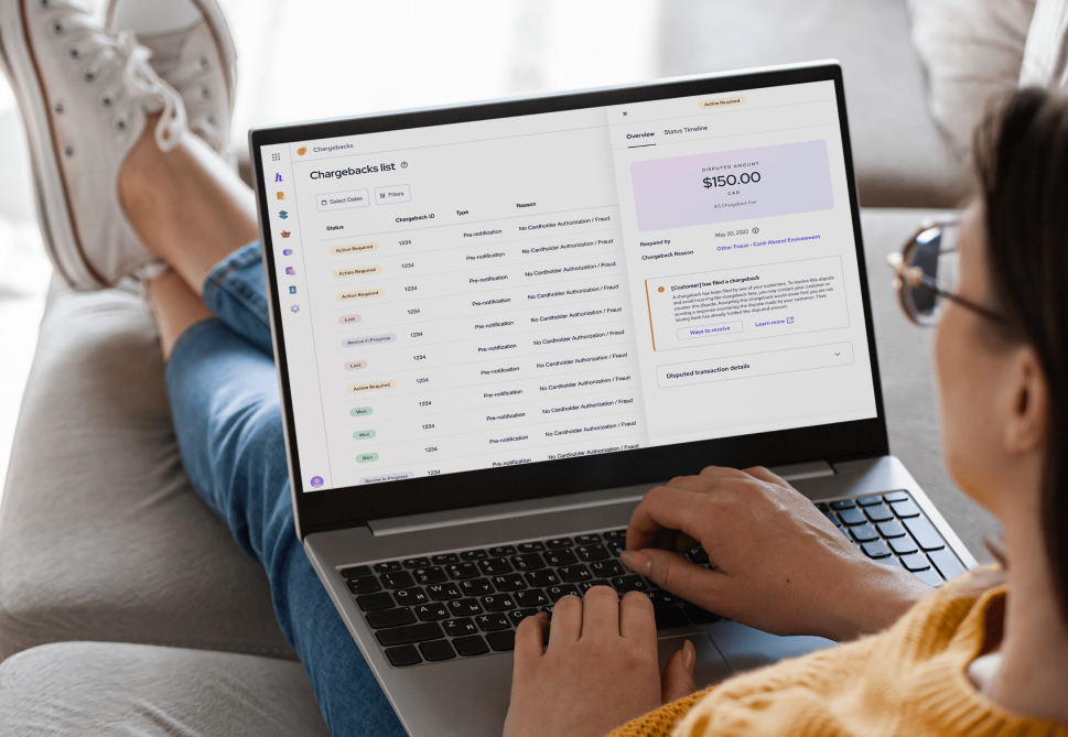 merchant looking at an ach chargeback on their computer