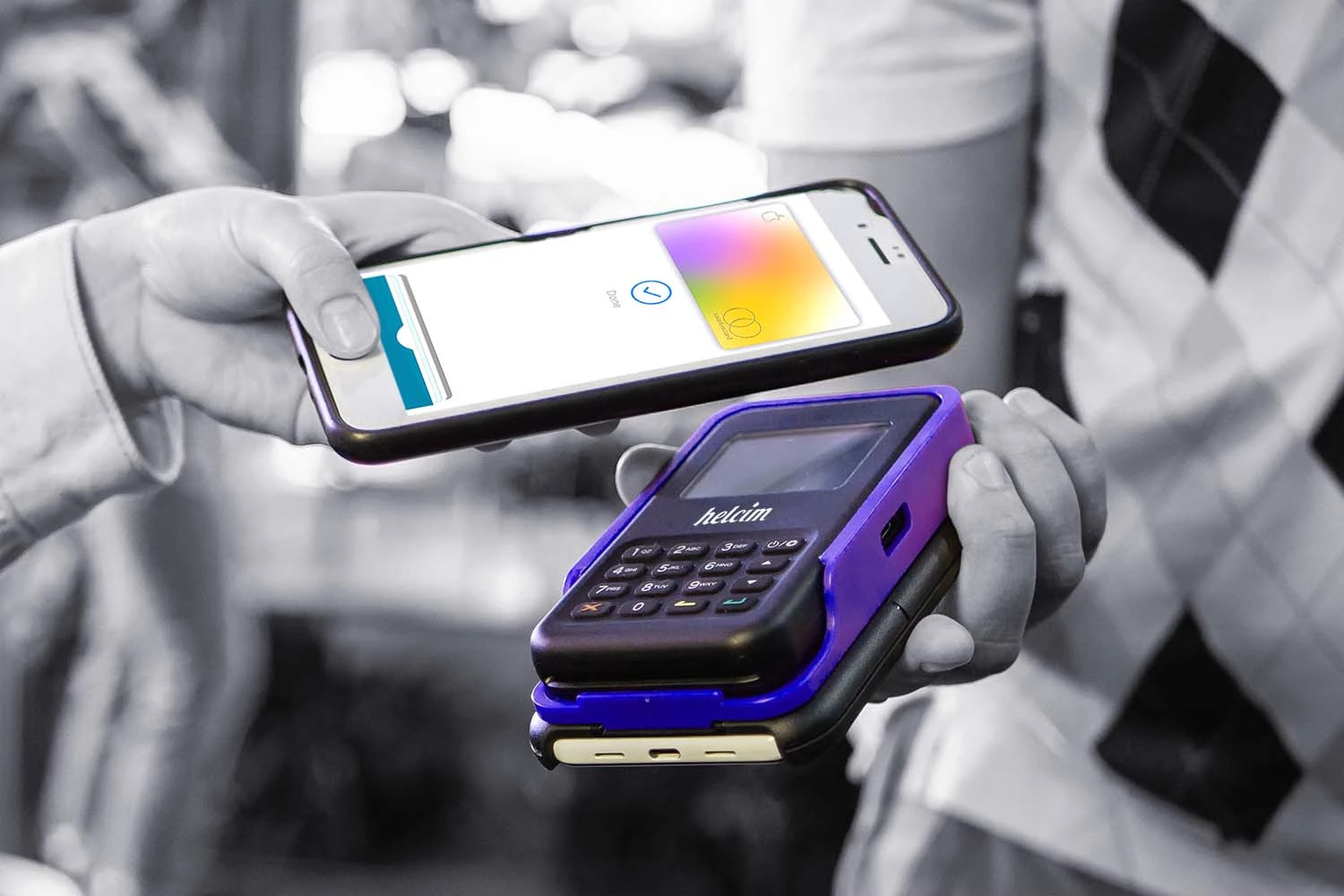 Helcim card reader receiving contactless payment with Apple Pay