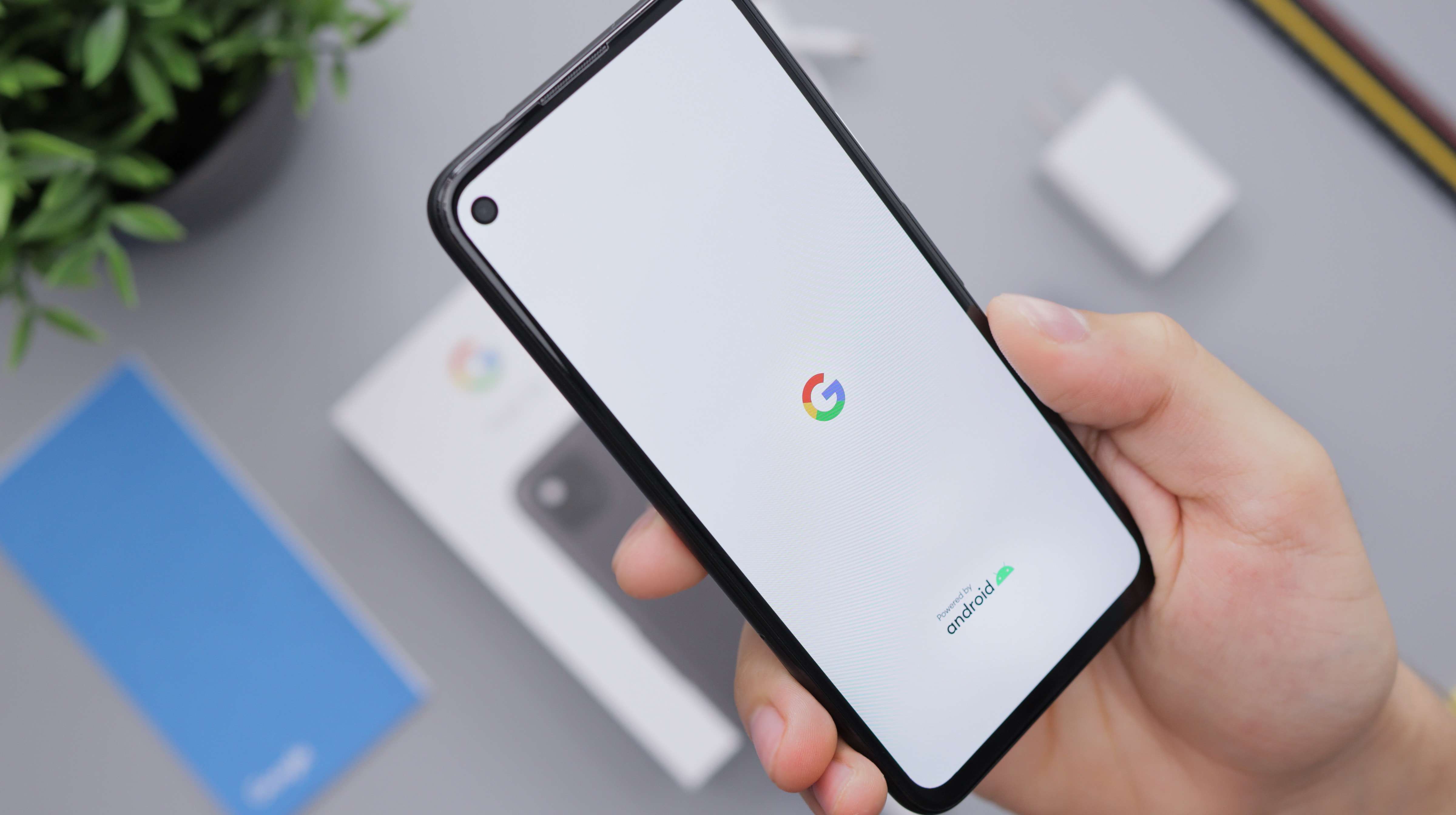 A cellphone with the Google logo