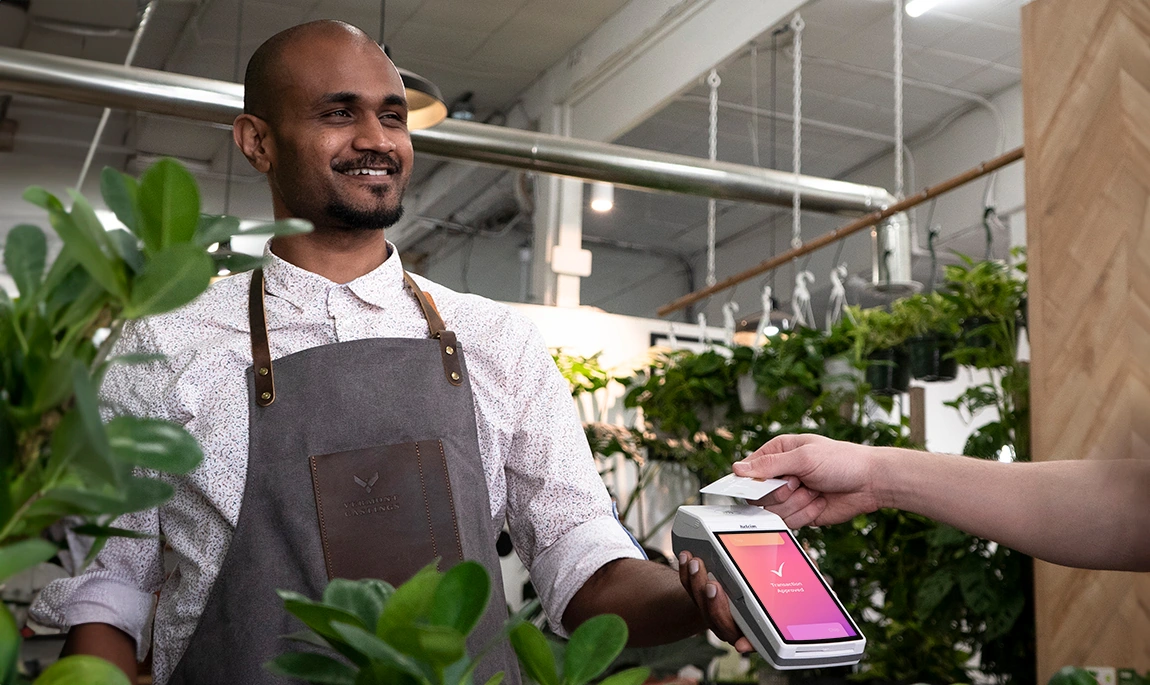 [A buisness owner accepts an in-person payment with the Helcim Smart Terminal](/images/hero-healthcare-3c.webp)