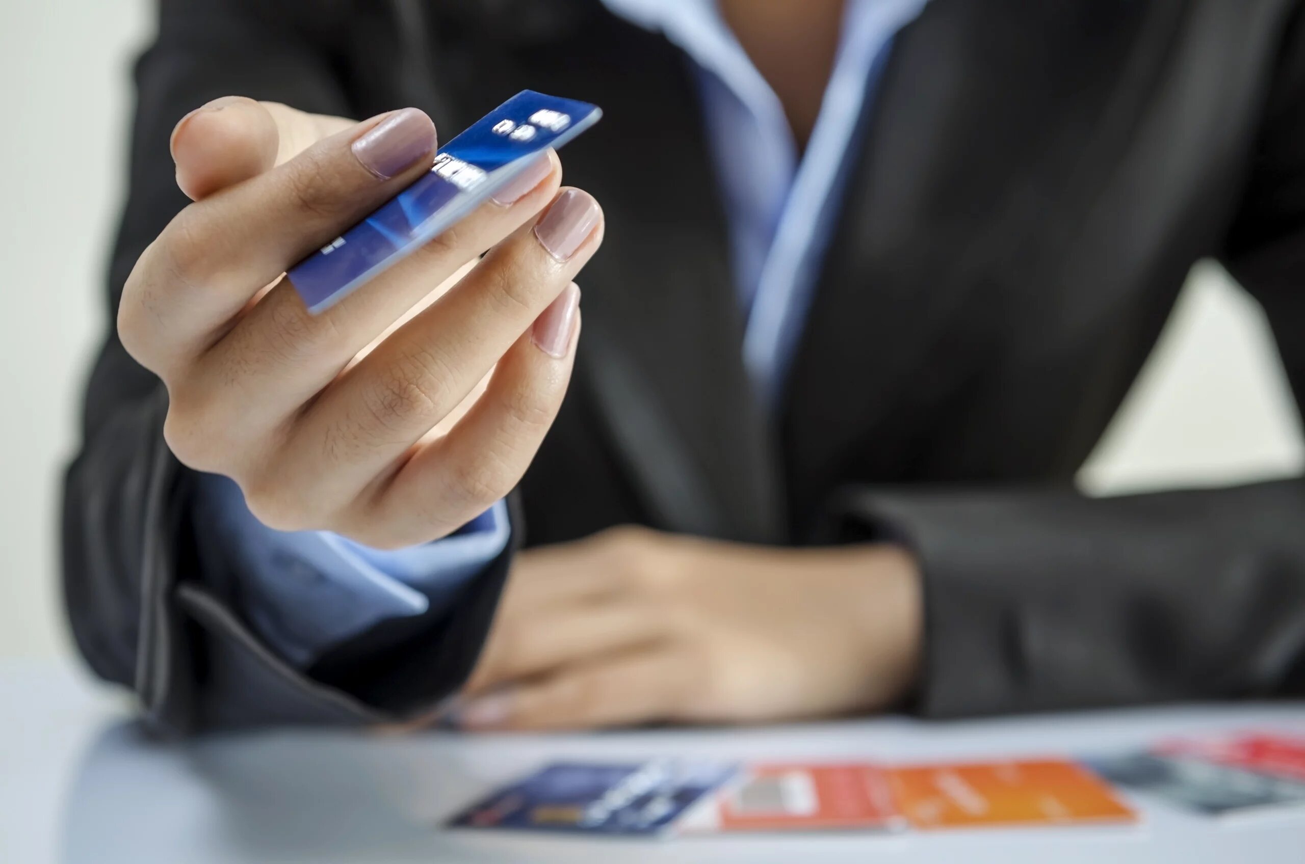 Businesswoman paying with credit card